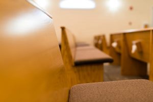 chapel pews close up, funeral home, memorial service