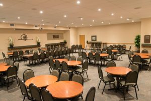 reception room with chairs and tables